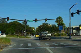 Scott Street continues with one through lane toward Ybor City while Jefferson Street south defaults onto Orange Avenue South toward Amalie Arena and the Channel District.