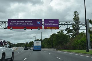 Buena Vista Drive proceeds west from Disney Springs to Bonnet Creek Parkway north and a parclo interchange with Epcot Center Drive.