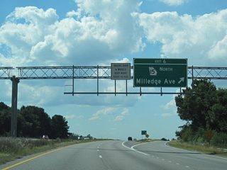 SR 15 Alternate follows the pre-freeway alignment of U.S. 129/441 north along Milledge and Prince Avenues through Athens to SR 10 Loop at Exit 14. Macon Highway stems west from Milledge Avenue and Exit 6 as the old alignment of U.S. 129/441 into Oconee County.