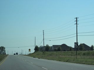 SR 20 continues northeast from Westridge Parkway toward the city of McDonough.