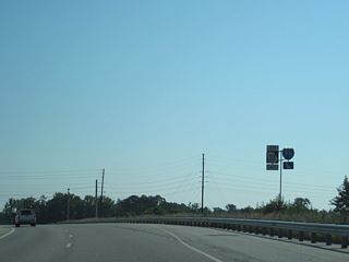 Hampton Locust Grove Road runs east from SR 20 in Hampton to SR 155 at Bill Gardiner Parkway. Bill Gardiner Parkway meets Interstate 75 at Exit 212 in the city of Locust Grove.