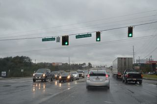 Paralleling the freeway along U.S. 19/SR 400, Market Place Boulevard heads north along an array of big box retail and other businesses 2.55 miles to Bald Ridge Marina Road. Ronald Reagan Boulevard extends the arterial southwest.
