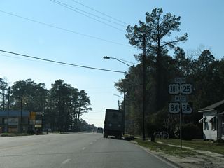 U.S. 25/301-SR 23 accompany U.S. 84/SR 38 southwest 9.70 miles to Jesup.