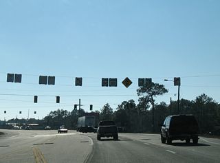 Rayonier Road stems west from U.S. 25/84/301 at Doctortown to SR 169 (Lanes Bridge Road).
