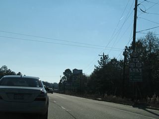 U.S. 84 continues southwest onto 1st Street toward Downtown Jesup. U.S. 25/301 overlap another 2.76 miles to U.S. 341 (Cherry Street).