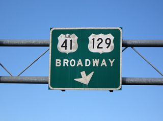 Button copy overheads at the north split of U.S. 41/129 were replaced in kind by 2012. The sign bridge was removed during construction of the roundabout where the two routes separate. U.S. 129/U.S. 41BU overlap north to Downtown Macon.