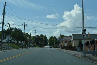 U.S. 41BU/SR 49 continue another 0.33 miles west on Walnut Street to SR 19 (Spring Street).