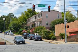 U.S. 41BU is unmarked where it joins SR 19 south along Spring Street. SR 49 follows SR 19 north on Spring Street, combining with U.S. 23/129 nearby, across the Ocmulgee River to Interstate 16 and Emery Highway.