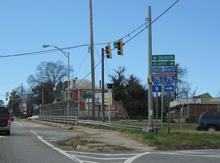 Georgia Avenue leads U.S. 41BU/SR 19 northbound onto Hardeman Avenue just ahead of the split diamond interchange (Exit 164) with Interstate 75.