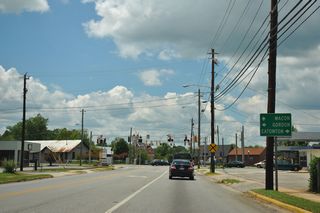 SR 18 formerly headed south from the intersection of Clinton Street and Eatonton Highway in Gray. SR 18 was realigned to bypass the city center along Bill Conn Parkway to the west and south.