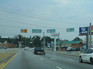 U.S. 23/SR 19 southbound split with U.S. 129/SR 11-49 north at Emery Highway. U.S. 23/SR 19 line Emery Highway east 0.54 miles to Coliseum Drive, where U.S. 80/SR 540 joins the routes east.
