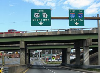 Interstate 16 west concludes at a three-wye interchange with I-75 just west of U.S. 23/129 across the Ocmulgee River.