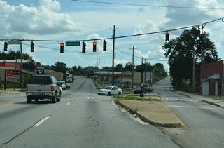 Houston Avenue branches west from U.S. 80/129/41BU at Concord Street. Martin Luther King, Jr. Boulevard becomes Broadway south of the signalized intersection.