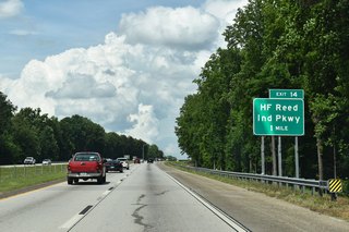 Opened January 2020, I-985 / U.S. 23 next meet H.F. Reed Industrial Parkway at a diamond interchange (Exit 14).