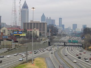 I-75/85 (Downtown Connector) pass below U.S. 19/SR 9 (14th Street) at Midtown Atlanta with 16 overall lanes.