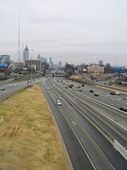 An HOV ramp separates for the continuation of the carpool lane along Interstate 75 northbound.