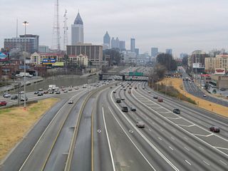 The HOV lane from I-75 south converges with the roadway along I-85 south from the Brookwood Interchange.