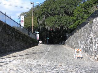 The East Broad Ramp ties into the signalized intersection of Rossiter Place and Bay Street at Emmet Park.