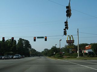 Eisenhower Drive intersects Waters Avenue west from Bacon Park and east from the commercial strip along Abercorn Street.