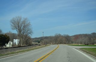 Emerging from a narrow strip of land between the Mississippi River bluffs and Wyoming Slough along Iowa 22 west near Sweetland Road.