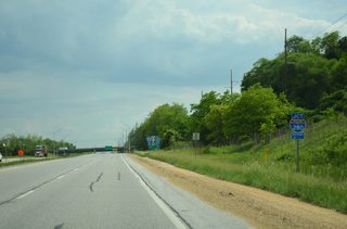 Iowa 22 (Rockingham Road) advances 0.9 miles south to a diamond interchange with Interstate 280.