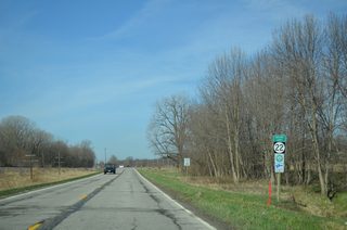 Westbound Iowa 22 crosses the Muscatine County line and leaves the city of Buffalo north of Andalusia Island on the Mississippi River.