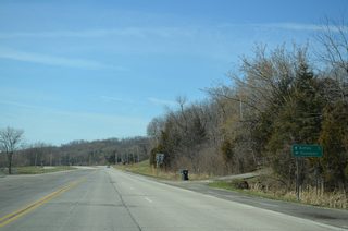 Iowa 22 follows Rockingham Road southwest five miles from U.S. 61 Business. West Drive Drive leads east 3.5 miles to Downtown Davenport.