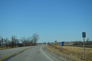 Iowa 22 shifts northward to a series of hills at 180th Street.