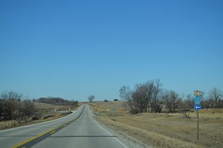 Muscatine County Road G20 trends southward to the county line, where it turns west along 660th Street SE to CR W66.