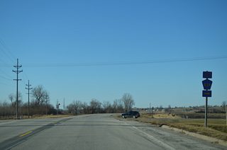 Muscatine County Road X34 (Davis Avenue) ventures north from Iowa 22 on the west side of Nichols to U.S. 6 and West Liberty.