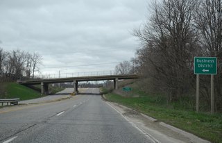 U.S. 34/63 travel under Main Street ahead of the east end of U.S. 34 Business (Roemer Avenue) to Downtown Ottumwa.