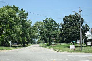 U.S. 63 (State Street) turns west along 13th Street for four blocks.