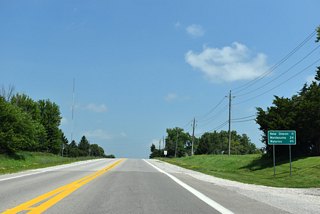 U.S. 63 turns east at New Sharon 11 miles ahead. The seat of Poweshiek County, Montezuma lies 13 miles further.