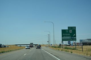 Business Loop I-15/U.S. 26 east cross the Snake River ahead of the north end of U.S. 91 and turn onto Yellowstone Highway north.