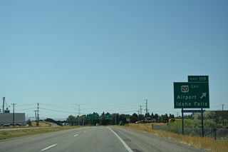 A parclo interchange joins Interstate 15 with Grandview Drive west to Idaho Falls Regional Airport (IDA) and U.S. 20 east ahead of Lindsay Boulevard.