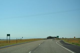 Interstate 15 south enters Bonneville County within the diamond interchange at Exit 128.