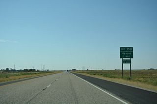The unincorporated community of Hamer lies just east of Exit 150 at 2100 N and Old Butte Highway (Old U.S. 91).