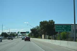 U.S. 20/26 branches northwest to Garden City from the Boise Connector (I-184) at a wye interchange with Chinden Boulevard in a half mile.