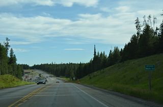 Curving westward, U.S. 20 advances south into the community of Macks Inn.