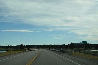U.S. 20 crosses the Henrys Fork river again over the Osborne Bridge ahead of milepost 379.