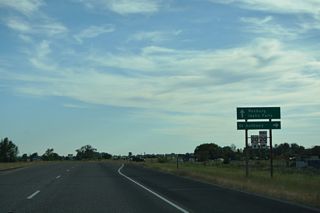 Measuring 2.92 miles in length, U.S. 20 Business runs west along Yellowstone Highway and Bridge Street south through Downtown St. Anthony.