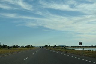 U.S. 20 curves southward into west Rexburg on the ensuing stretch.
