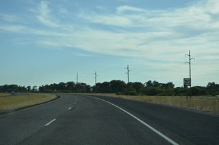 Curving southwest away from the Henrys Fork river, U.S. 20 leaves the St. Anthony city limits.