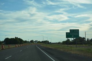 Old U.S. 20 continues 1.76 miles south from the diamond interchange at Exit 347 along Bridge Street and Yellowstone Highway to U.S. 20 at Exit 343.