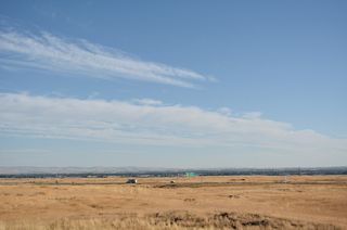 A parclo interchange with an extremely large foot print joins I-84 with U.S. 93 at Exit 173. Originally a compact diamond interchange joined the two highways.