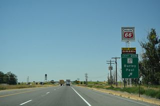 Spring 2024 to late 2026 road work at Exit 208 redesigns the parclo with ID 27/Business Loop I-84 into a modified tight diamond interchange.