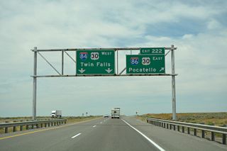 The I-84/86 Salt Lake City Interchange was rebuilt during road work from May 2018 to Winter 2020. The westbound roadway for I-84 was realigned to improve the geometry and so that traffic from I-86/U.S. 30 west merges from the right.