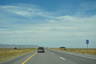 Interstate 84 continues northwest through the Raft River Valley from Exit 245 to Exit 237.