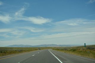 Interstate 84 curves northward beyond mile marker 251 past Big Canyon.