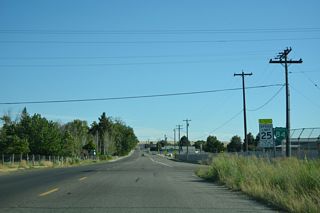 The first confirming marker for Business Loop I-84 east at Glenns Ferry stands along Bannock Street south at Ball Park Drive west.